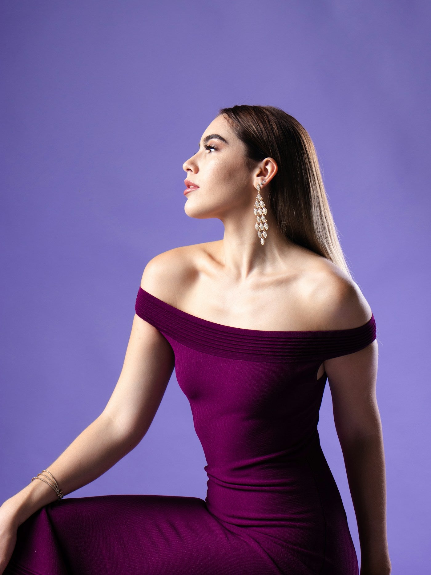 Woman wearing the Peddify Aurora Evening Column Dress